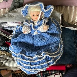 Doll-plastic bag holder